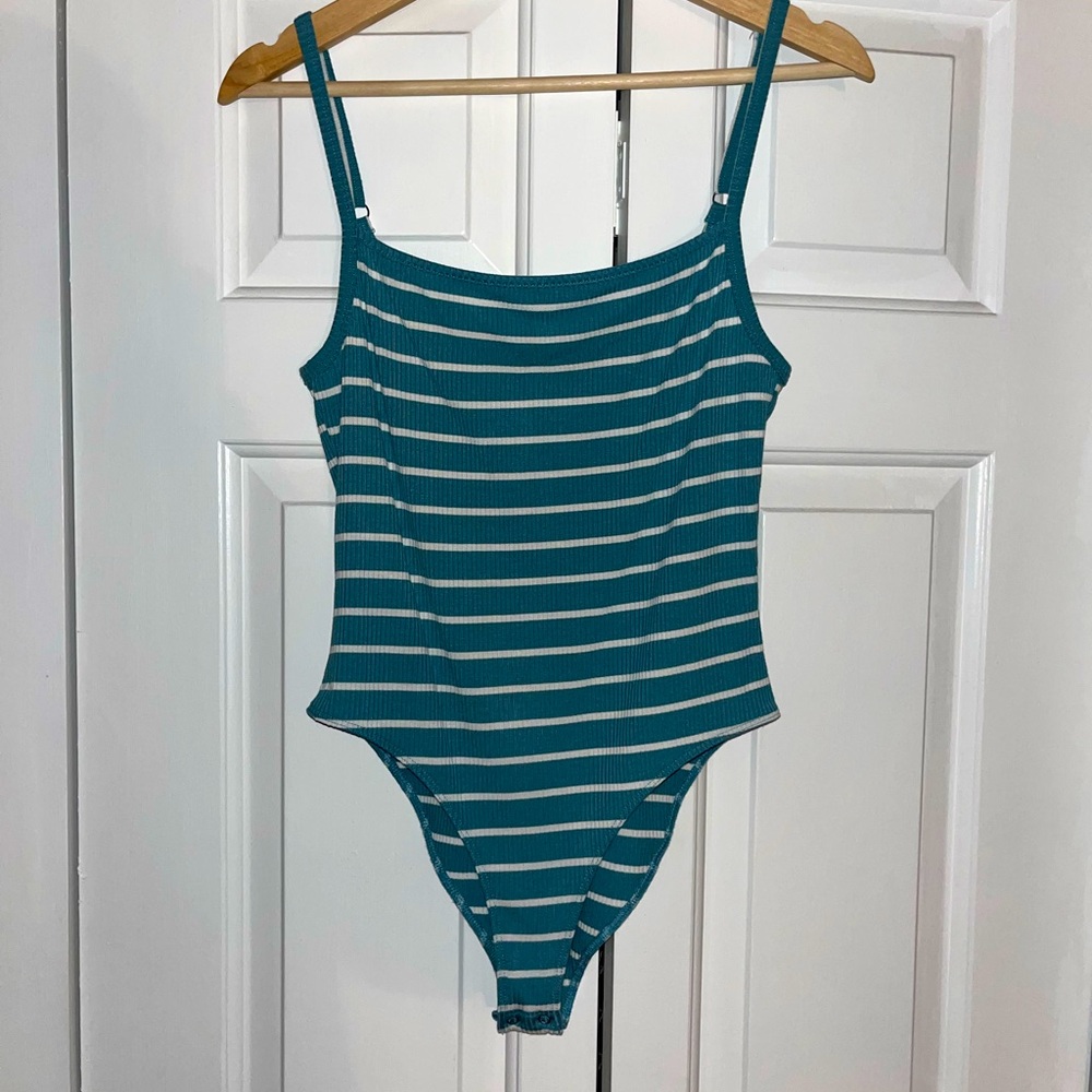 Blue and white adjustable body suit size M